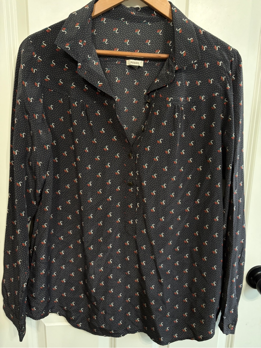 Excellent condition size L Fossil silk  button down blouse with  Swan Motif